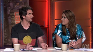 Todd Sampson wearing an Aborignial flag t-shirt