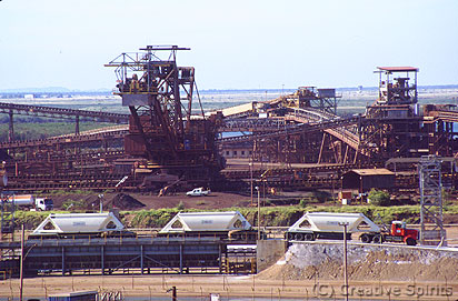 Port Hedland. BHP iron ore plant. Note the salt truck in the foreground unloading.